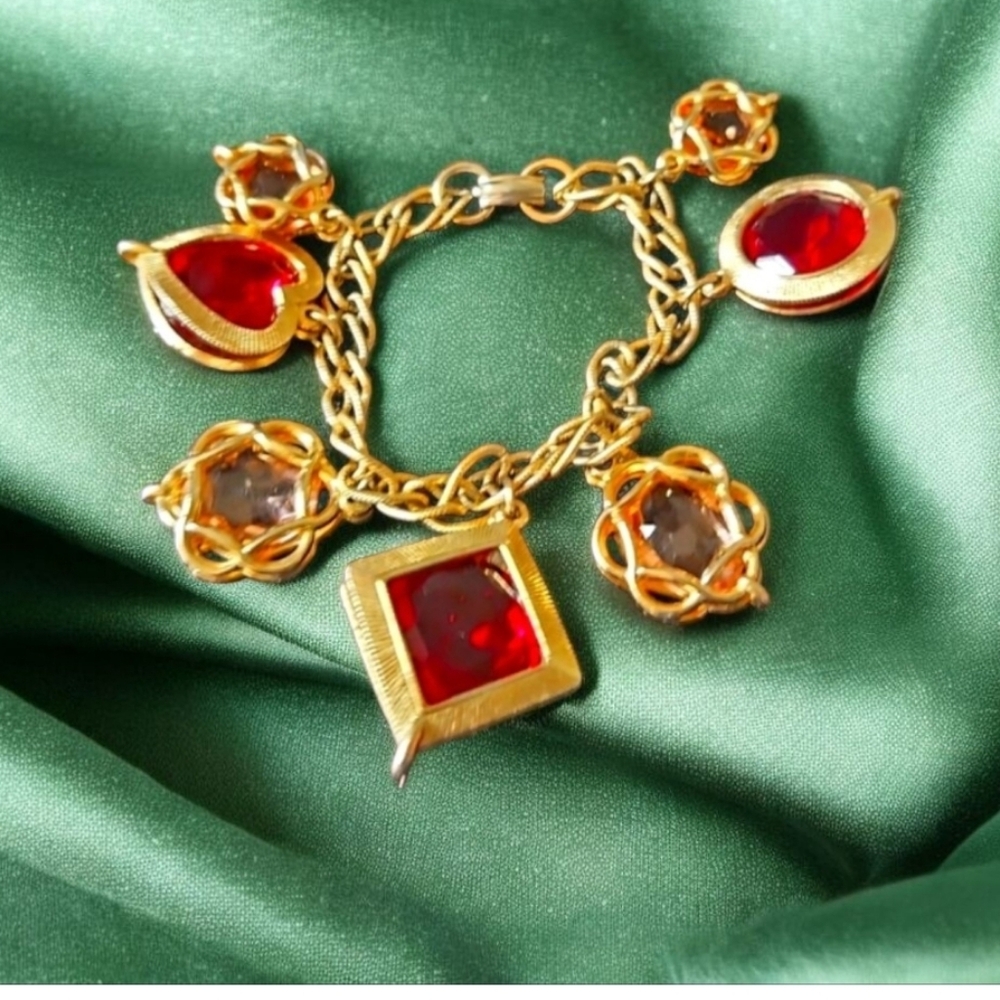 Eve St Laurent Bracelet Elegant Gold Toned RED  & TOPAZ Charm Bracelet.